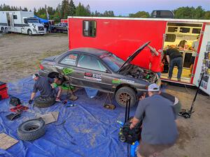 Jordan Locher / Tom Addison Subaru Impreza 2.5RS gets repairs after rolling on day one of the rally.