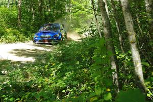 Travis Pastrana / Rhianon Gelsomino Subaru WRX STi at speed on SS10, Strawberrry Mountain II.