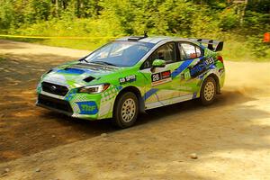 Rob Sanders / Boyd Smith Subaru WRX STi at speed on SS10, Strawberrry Mountain II.