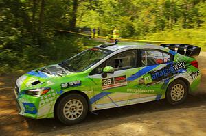 Rob Sanders / Boyd Smith Subaru WRX STi at speed on SS10, Strawberrry Mountain II.