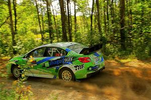 Rob Sanders / Boyd Smith Subaru WRX STi at speed on SS10, Strawberrry Mountain II.