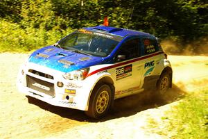 Brad Morris / Michael Hordijk Mitsubishi Mirage at speed on SS10, Strawberrry Mountain II.