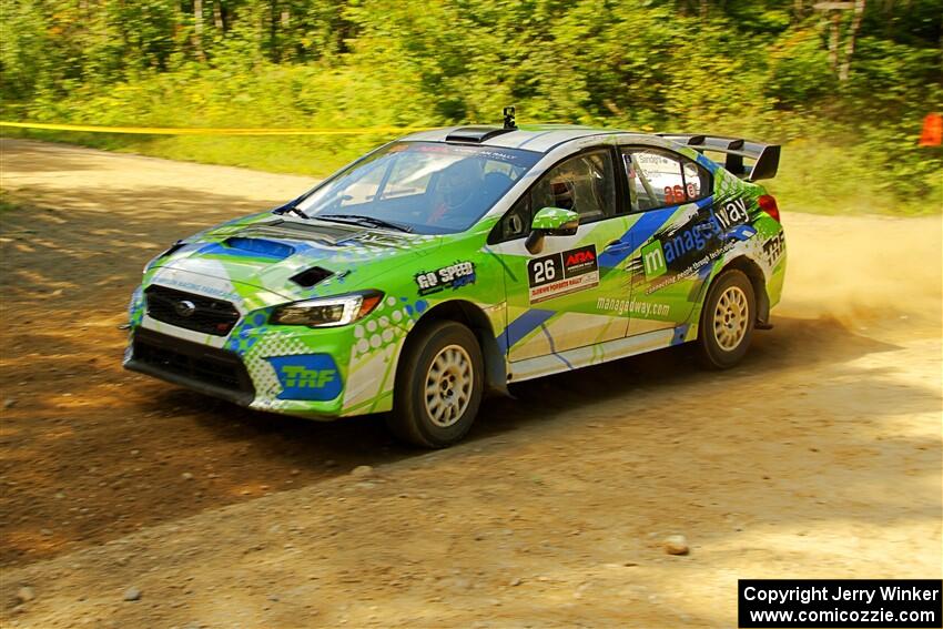 Rob Sanders / Boyd Smith Subaru WRX STi at speed on SS10, Strawberrry Mountain II.