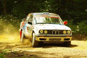 Calvin Cooper / Kelsey Stephens BMW 318is on SS11, Height O' Land II.