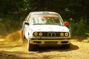 Calvin Cooper / Kelsey Stephens BMW 318is on SS11, Height O' Land II.