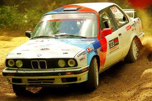 Calvin Cooper / Kelsey Stephens BMW 318is on SS11, Height O' Land II.