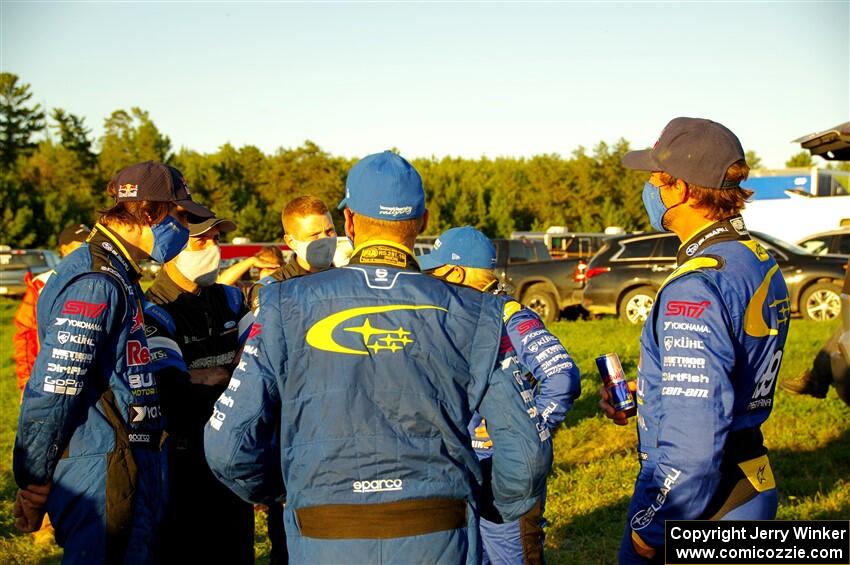 L to R) Brandon Semenuk, Barry McKenna, Leon Jordan, John Hall, Rhianon Gelsomino and Travis Pastrana converse.