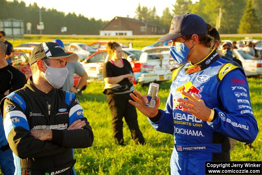 Barry McKenna and Travis Pastrana converse after the event.