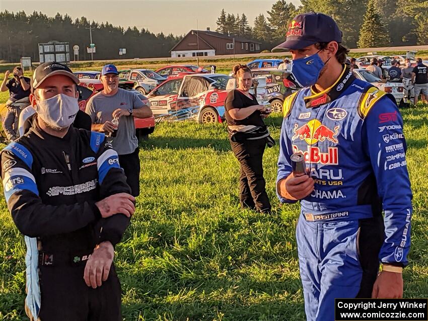 Barry McKenna and Travis Pastrana converse after the event.