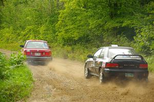 Gabe Jacobsohn / Zach Pfeil BMW 325e and Kristian Rue / Mark Rue Subaru Impreza 2.5RS on SS1, Steamboat I.