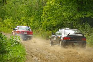 Gabe Jacobsohn / Zach Pfeil BMW 325e and Kristian Rue / Mark Rue Subaru Impreza 2.5RS on SS1, Steamboat I.