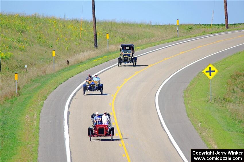 Jeff Berdass' 1908 Cadillac, Vince Smith's 1912 Maxwell and Dave Mickelson's 1911 Maxwell