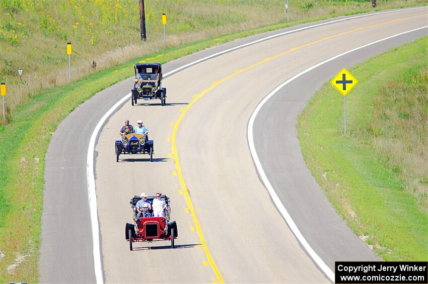 Jeff Berdass' 1908 Cadillac, Vince Smith's 1912 Maxwell and Dave Mickelson's 1911 Maxwell