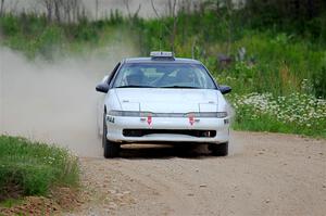 The '0' car, a Mitshibishi Eclipse GSX, does a second pass through SS1, J5 North.