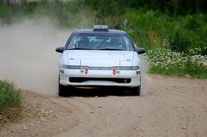 The '0' car, a Mitshibishi Eclipse GSX, does a second pass through SS1, J5 North.