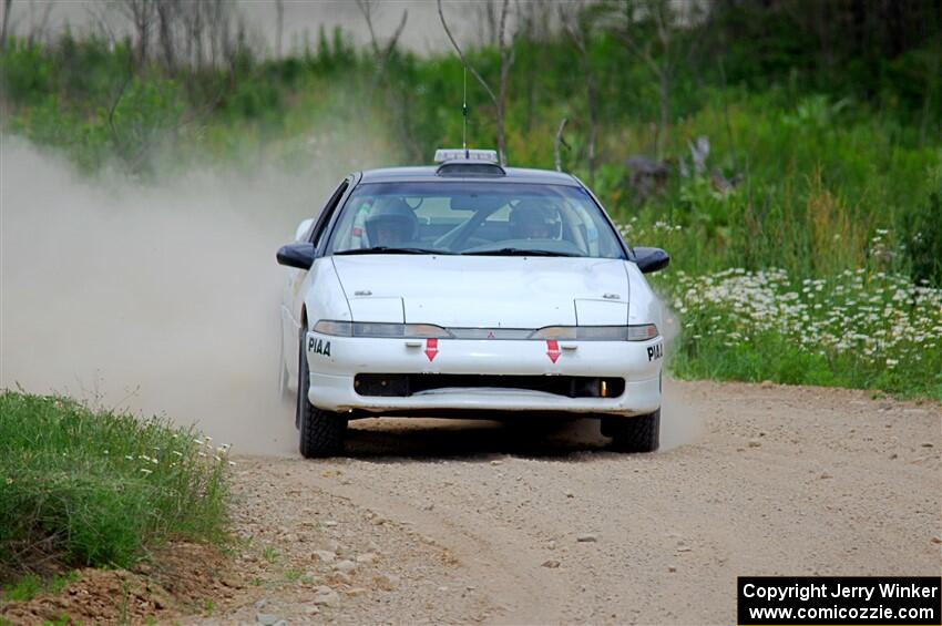 The '0' car, a Mitshibishi Eclipse GSX, does a second pass through SS1, J5 North.