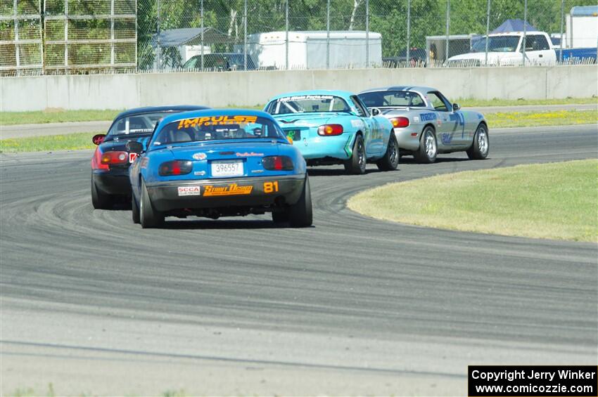 Chris Craft's, Jamey Randall's, Samantha Silver's and Gordon Kuhnley's Spec Miata Mazda Miatas