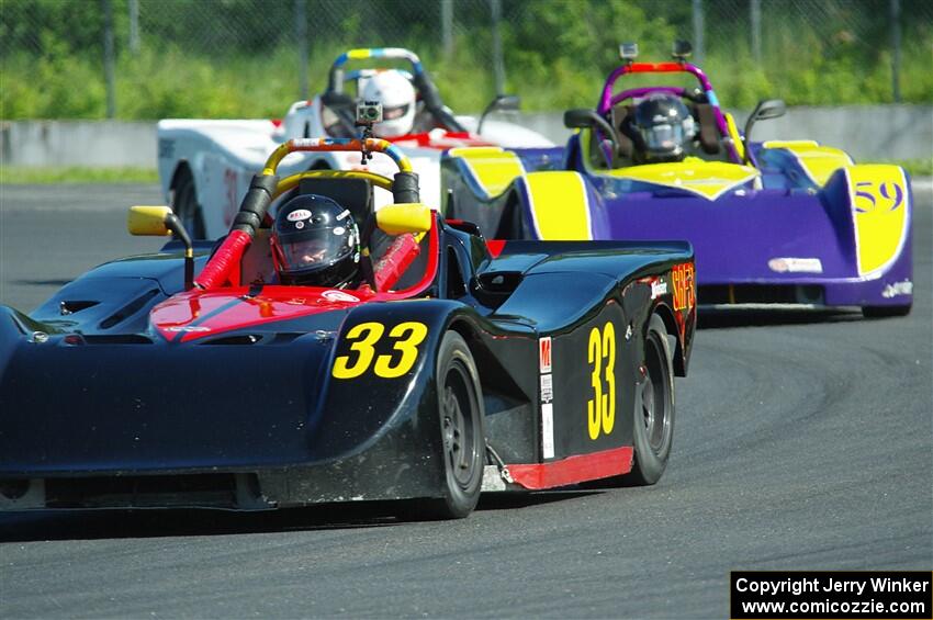 Dave Glodowski's, Andrew Cox's and Maksim Belov's Spec Racer Ford 3s