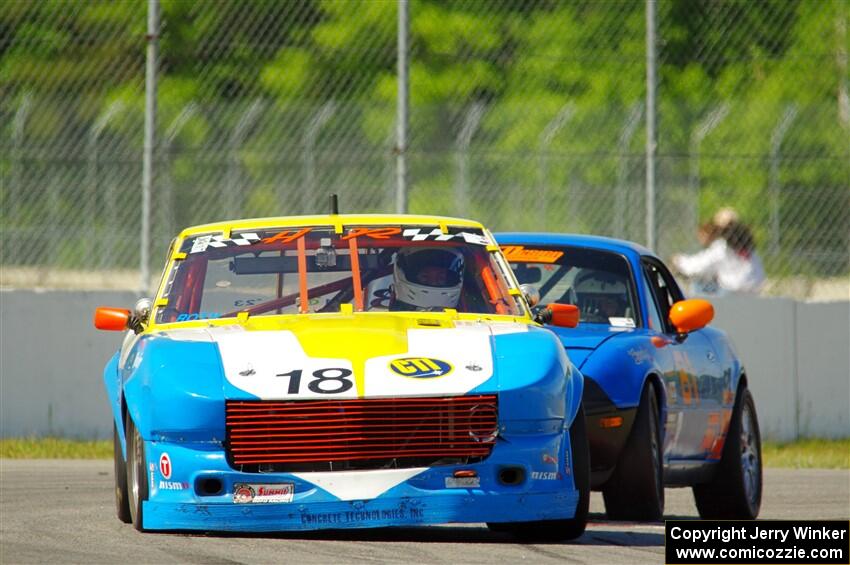 Howard Roth's E Production Datsun 240Z and Gordon Kuhnley's Spec Miata Mazda Miata