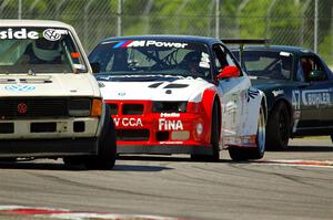 Jimmy Griggs' H Production VW Rabbit, Derek Wagner's ITE-1 BMW M3 and Sam Nogosek's Spec Miata Mazda Miata