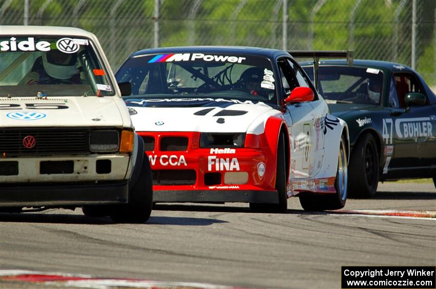 Jimmy Griggs' H Production VW Rabbit, Derek Wagner's ITE-1 BMW M3 and Sam Nogosek's Spec Miata Mazda Miata