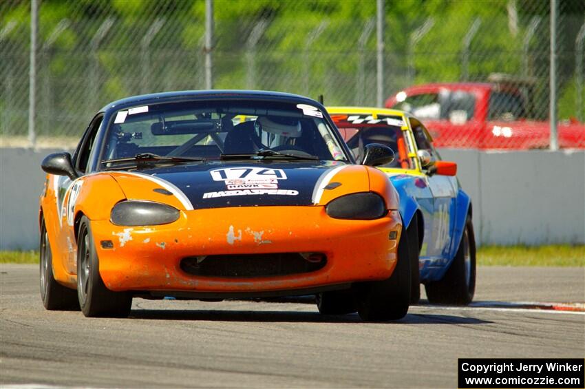 Cam Ebben's Spec Miata Mazda Miata and Howard Roth's E Production Datsun 240Z