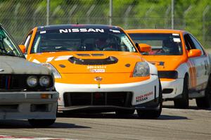 James Berlin's T3 Nissan 350Z and Sam Fisher's ITA Nissan 200SX SE-R