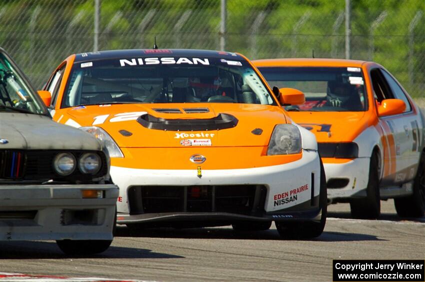 James Berlin's T3 Nissan 350Z and Sam Fisher's ITA Nissan 200SX SE-R