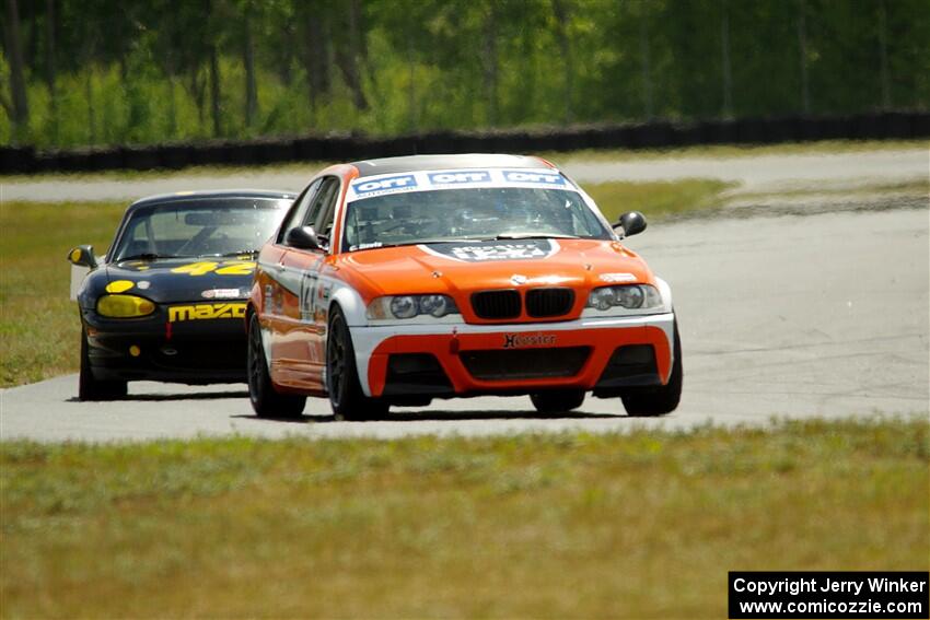 Chris Davis' SPU BMW 330 and Greg Youngdahl's Spec Miata Mazda Miata