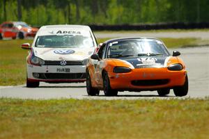 Cam Ebben's Spec Miata Mazda Miata and David Daly's T4 VW Golf TDI