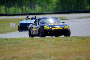 Greg Youngdahl's Spec Miata Mazda Miata and Brooke Fairbanks' H Production VW Rabbit Cabrio