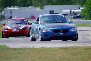 Roger Knuteson's T4 BMW Z4 and John Elder's STL Mazda Miata