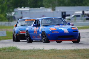 Geoff Youngdahl's STL Mazda Miata and Gordon Kuhnley's Spec Miata Mazda Miata