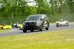 The Spec Racer Ford 3 field behind the pace car.