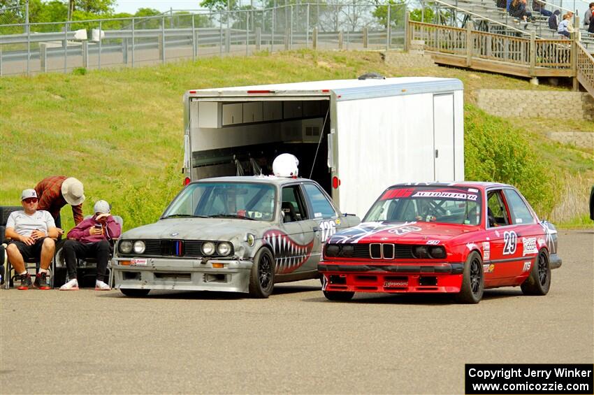 Brighten Hallberg's ITA BMW 328 and Mike Campbell's ITS BMW 325is in the paddock.