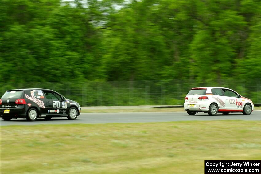 David Daly's STU VW Golf TDI ahead of Tom Daly's STU VW Rabbit