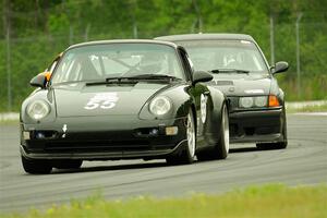 Phil Magney's ITE-1 Porsche 993 and C.J. Harayda's STU BMW M3