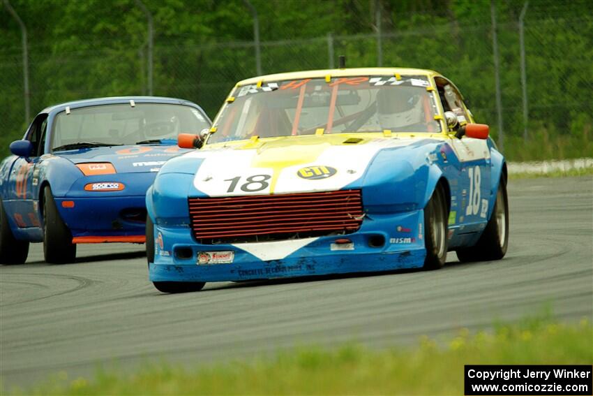 Howard Roth's E Production Datsun 240Z and Geoff Youngdahl's ITA Mazda Miata