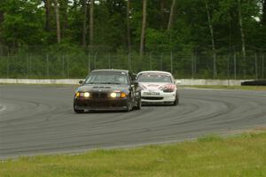 C.J. Harayda's SPU BMW M3 and Justin Elder's STL Mazda Miata