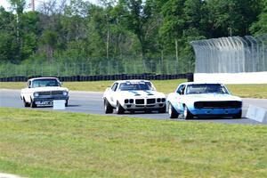 Scott Shadel's Chevy Camaro, Scott Graham's Pontiac Firebird and Damon Bosell's Ford Falcon