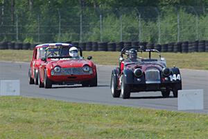 Mark Pladson's Morgan 4/4, Sean Alexander's Triumph TR-4 and Paul Bastyr's Austin Mini Cooper