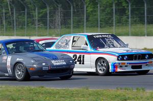 Drake Dittman's BMW 318is and Aaron Jongbloedt's Mazda Miata