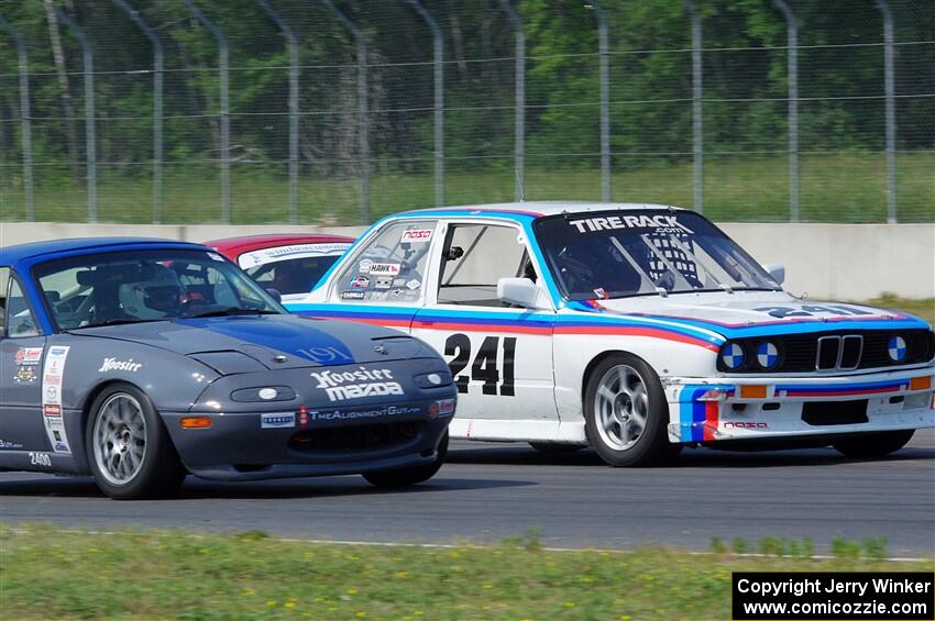 Drake Dittman's BMW 318is and Aaron Jongbloedt's Mazda Miata