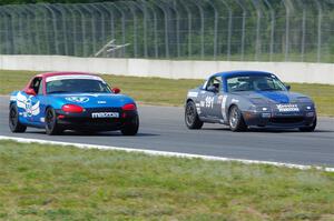 Aaron Jongbloedt's and Rick Buan's Mazda Miatas