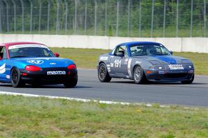 Aaron Jongbloedt's and Rick Buan's Mazda Miatas