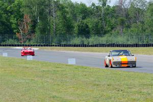 John Westberg's Porsche 914 and David Amys' Triumph Spitfire