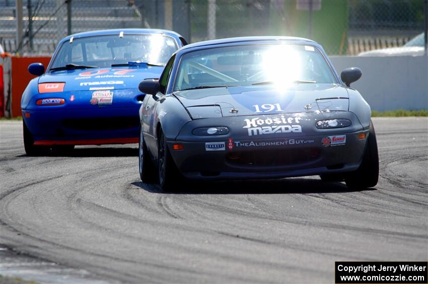 Aaron Jongbloedt's and Geoff Youngdahl's Mazda Miatas