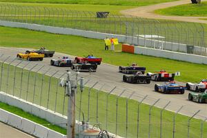 The Spec Racer Ford 3 field comes through turn 12 on the pace lap.