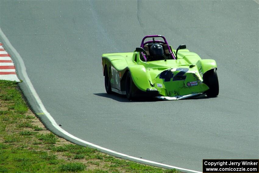 Robert Barton's Spec Racer Ford 3 drives along with heavy damage.