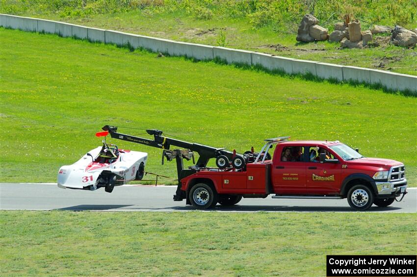 Sean Yahn's Spec Racer Ford 3 comes in on the hook.